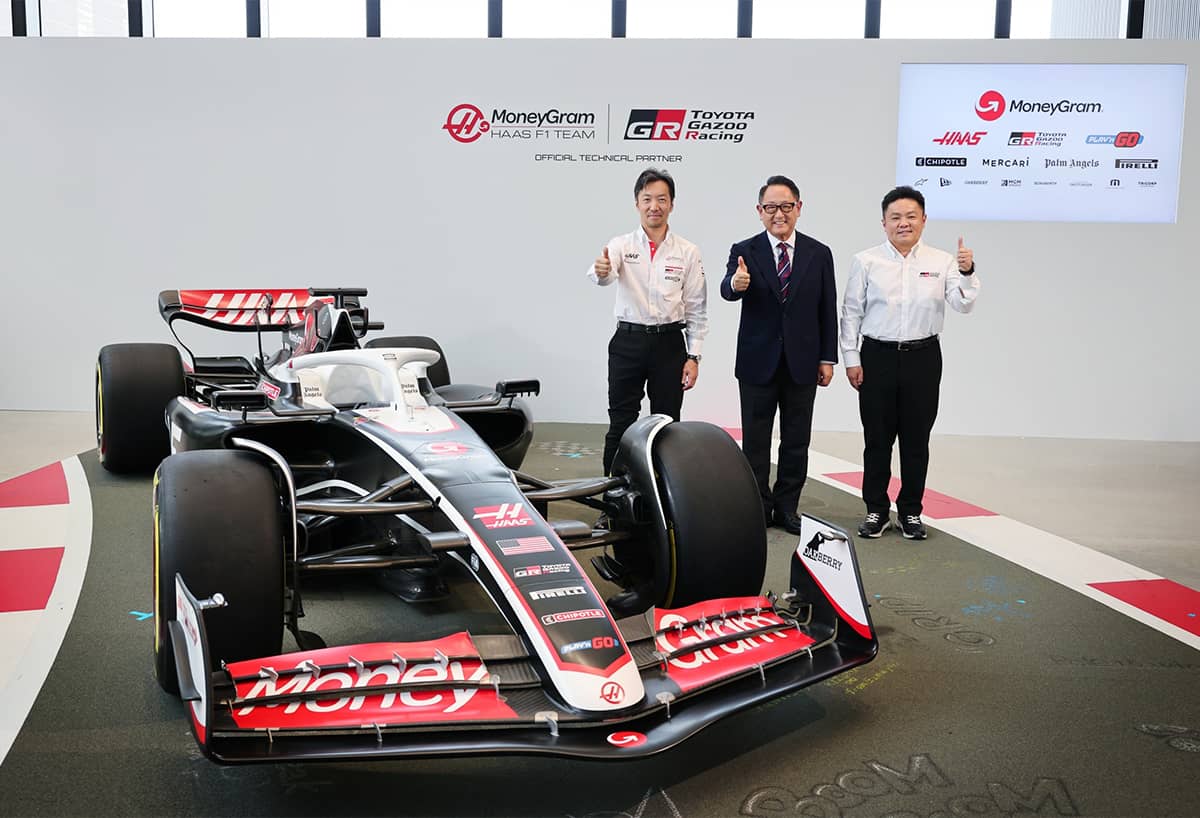 From left MoneyGram Haas F1 Team Team Principal Ayao Komatsu, Toyota Motor Corporation Chairman Akio Toyoda, and GAZOO Racing Company President Tomoya Takahashi