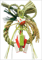 「しめ縄飾り」を簡略化した「輪飾り」も趣があっていいものです。これは子年のもの。稲穂が「五穀豊穣」を祈っていますね。
