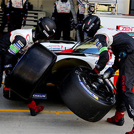 Two mechanics are changing the tyres