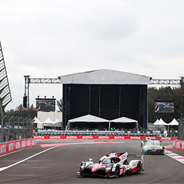 TS050 HYBRID with LM GTE Am Porsche at the stadium section of the Autodromo Hermanos Rodriguez