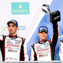Sébastien Buemi and Anthony Davidson, Kazuki Nakajima on the podium of third