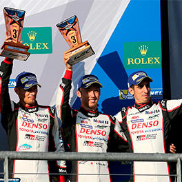 Stéphane Sarrazin, Kazuki Nakajima and Sébastien Buemi on the podium of the Circuit of the Americas