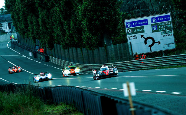 Vehicles traveling on the public road part of Salto Circuit