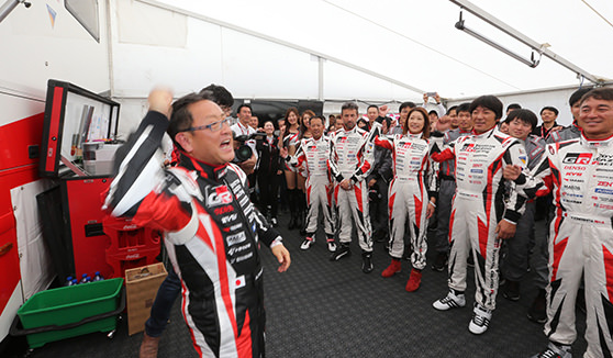 Team representative Akio Toyoda gives a motivational speech to the GAZOO Racing team